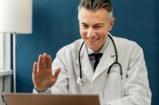 doctor-offering-medical-teleconsultation_23-2149328996.jpeg